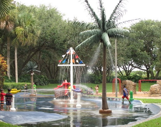 <p>Patch Reef Park - Boca Raton, FL<br>Splash Pads use Tropical Expressions palm trees with water spraying coconuts.</p> 
